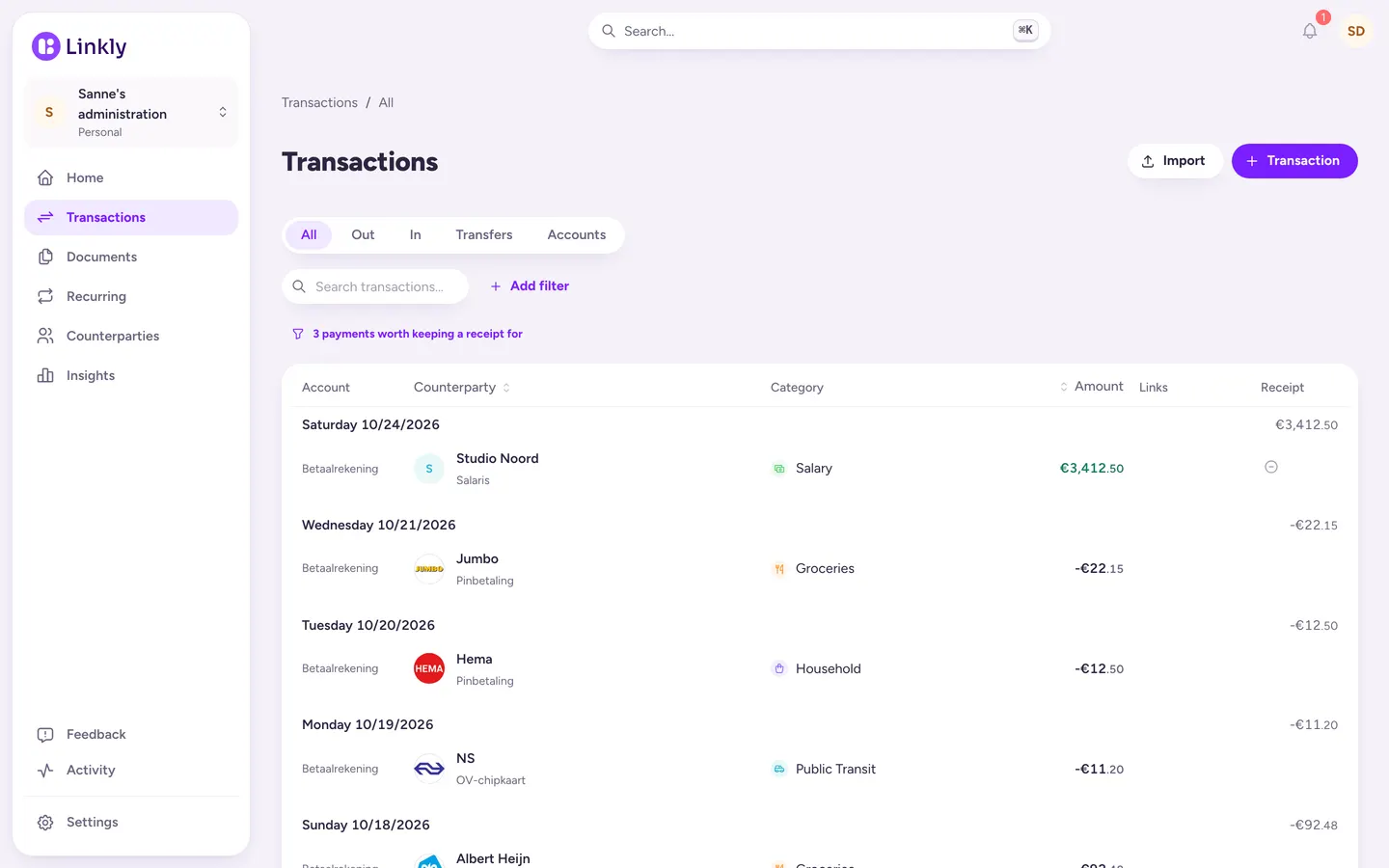 A list of transactions by day, with shop logos, categories and amounts.