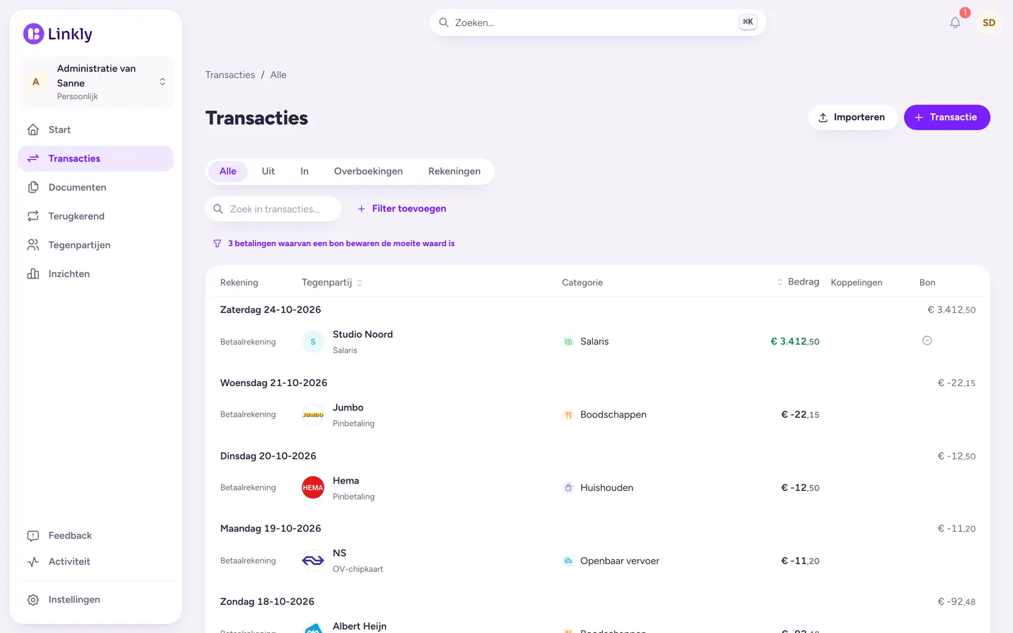 Lijst met transacties per dag, met logo's van winkels, categorieën en bedragen.
